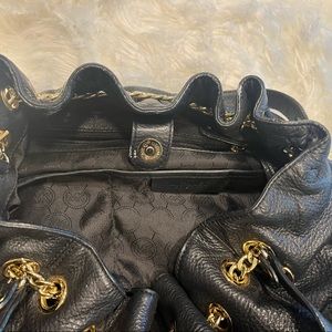 Michael by Michael Kors black leather purse with gold accent